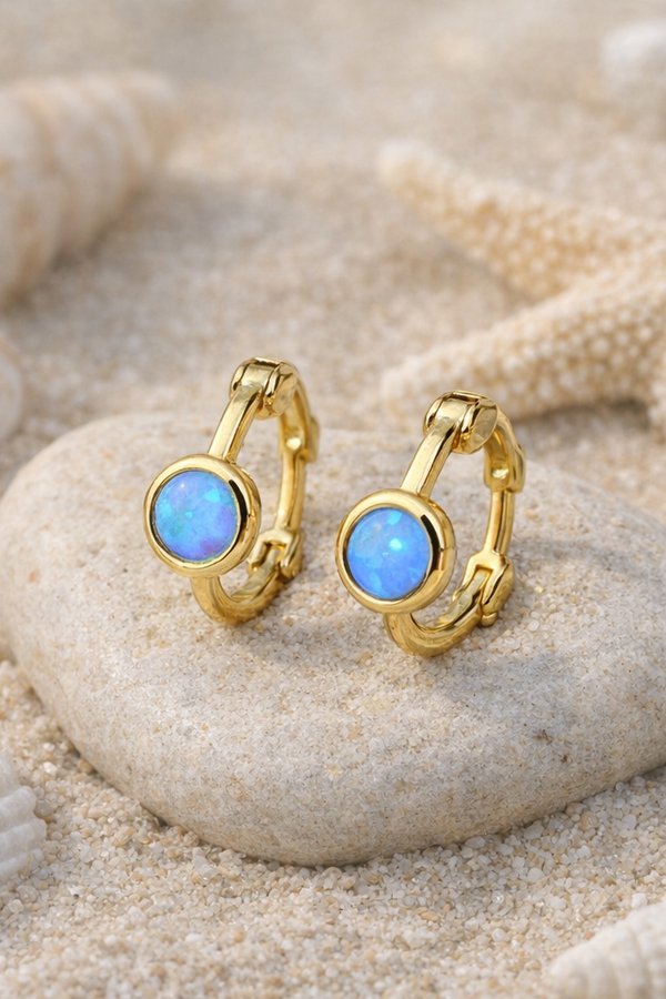 Emily – delicate blue glow in gold