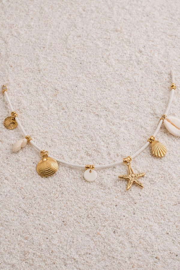 Piper – ocean charm bracelet, beachy gold accents, shell details